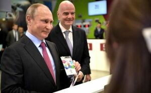 Путин и Инфантино получили в Сочи паспорта болельщиков