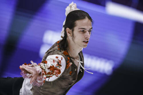 Петр Гуменник занимает пятое место после третьей разминки короткой программы Олимпиады